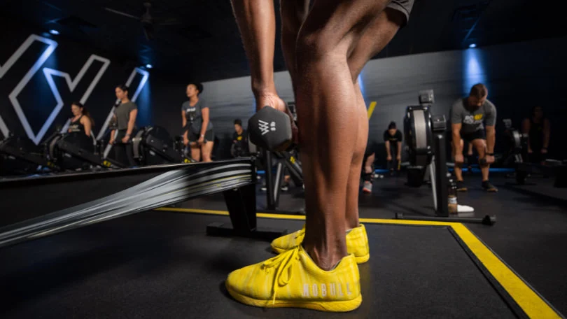 Grab your weights & feel the burn! Build strength through floor exercises to increase power on the rower. 