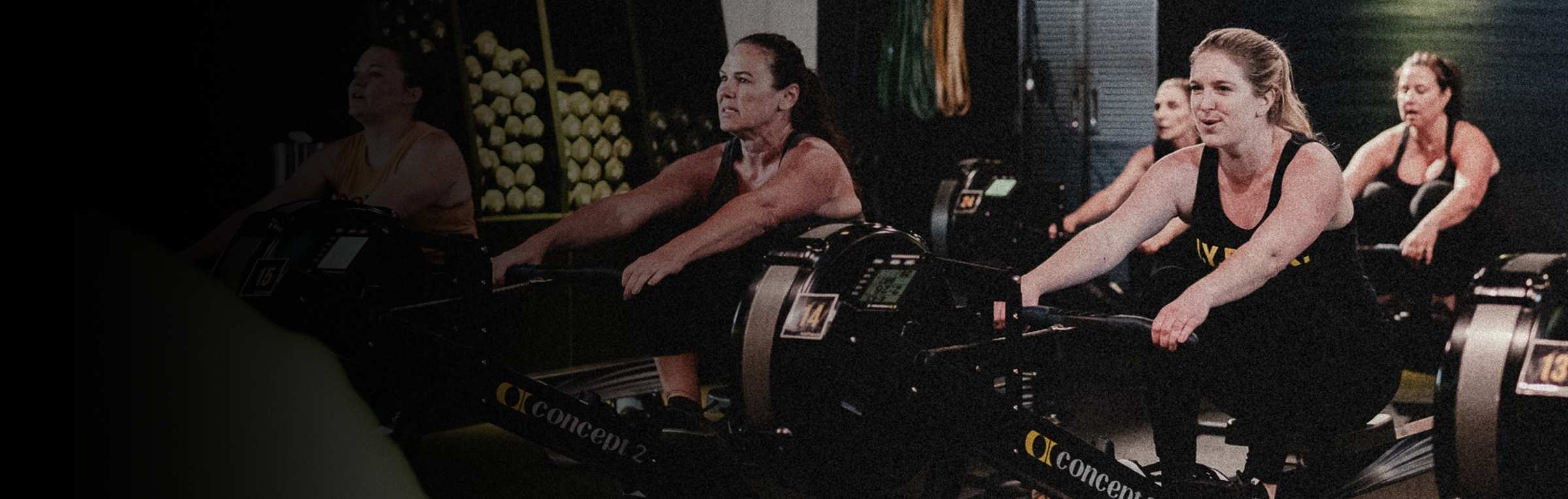 People rowing in a Rowing Gym (2)