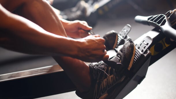 Person adjusting foot straps